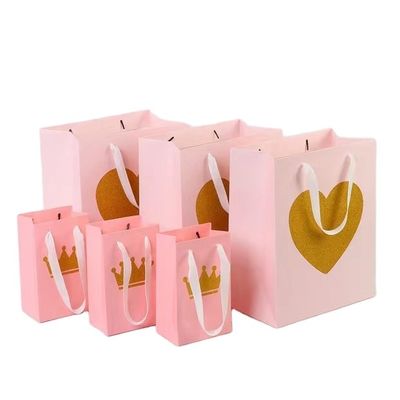 CMYK 4 cores Bolsas de papel impressas personalizadas Bolsas de papel de jóias boutique rosa